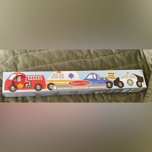 New Melissa and Doug wooden cars